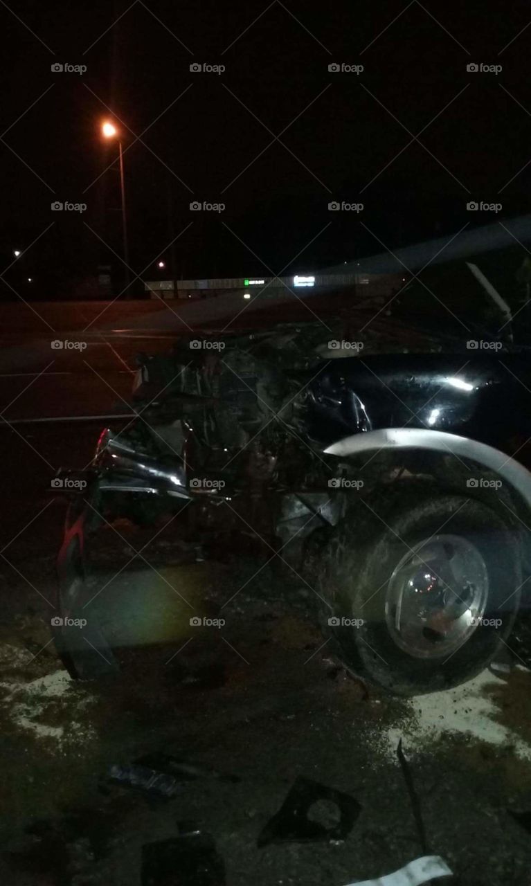 front of truck after being hit by a semi