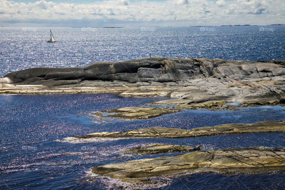 Sailboat at the coast. Sailing at the Norwegian coast. 