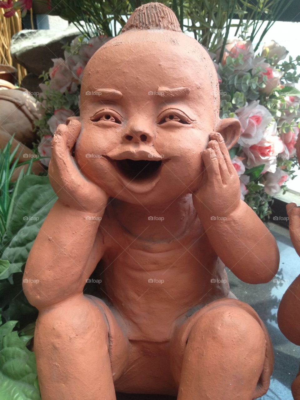 Child smile statue