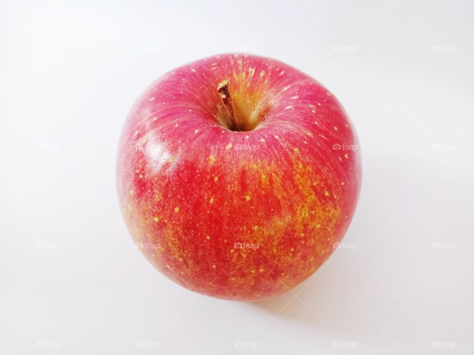 fresh red apple on white background