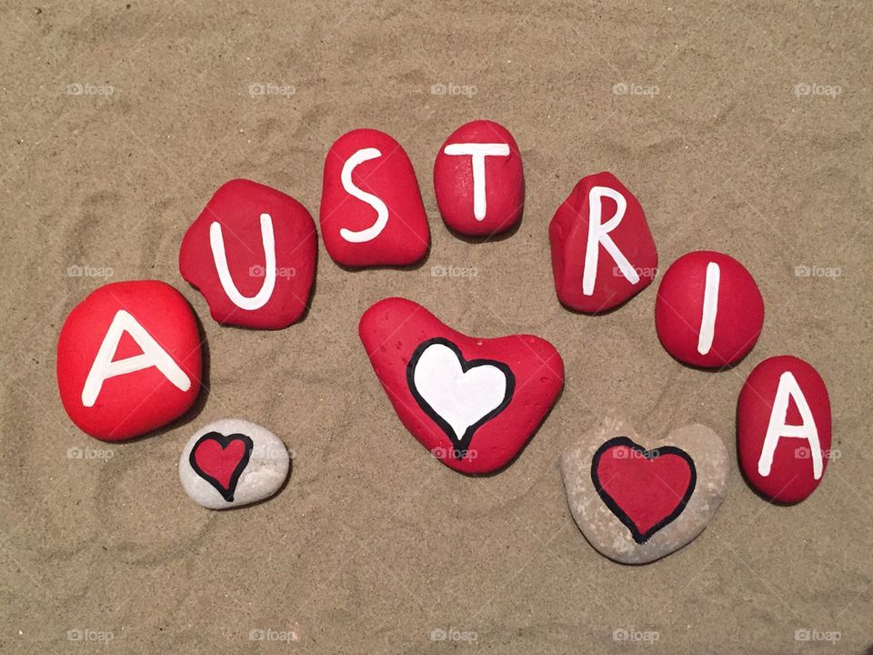 Austria my love, souvenir on red colored stones