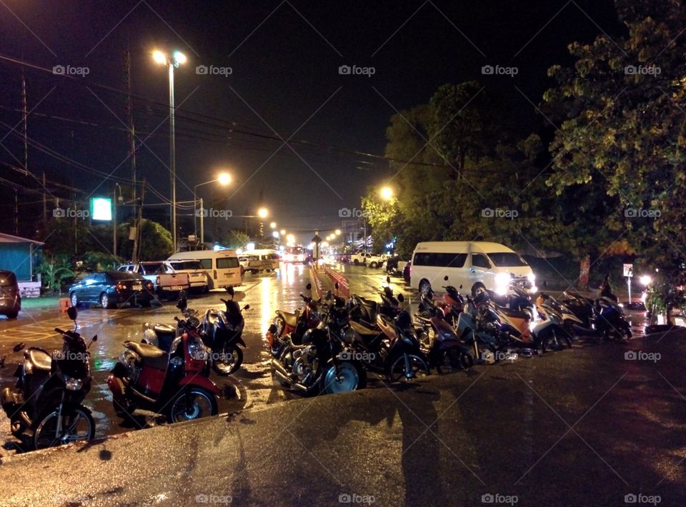 Motorbike parking. Motorbike parking near Rawai Pier after the rain