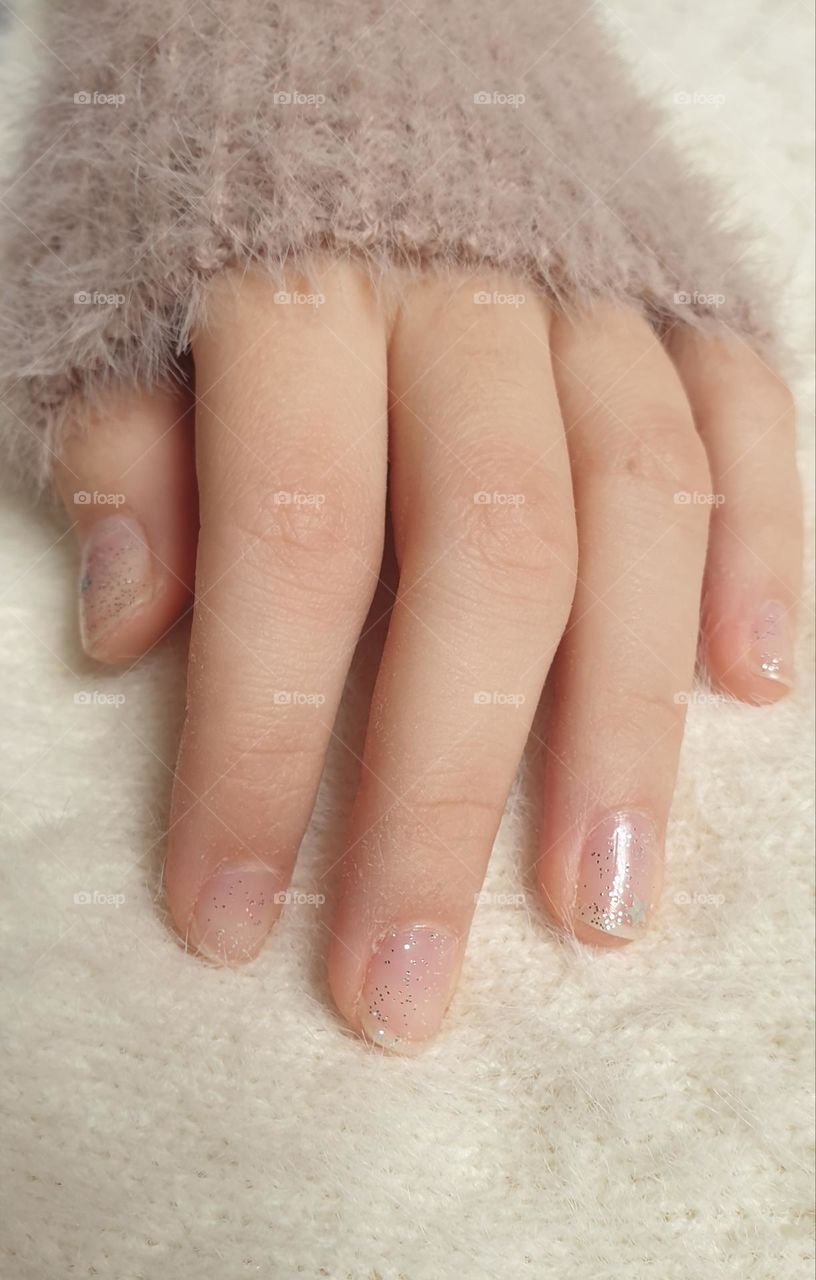 maintenance of your nails, with specific care, with a beautiful shine that highlights the beauty of your hands. glitter nail polish