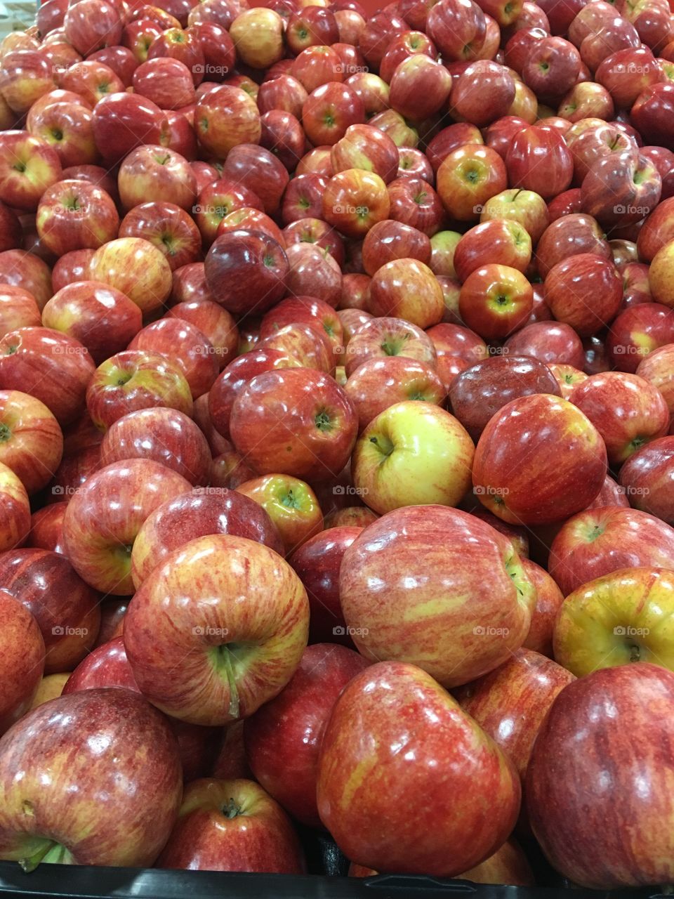Bunch of red apples on display 