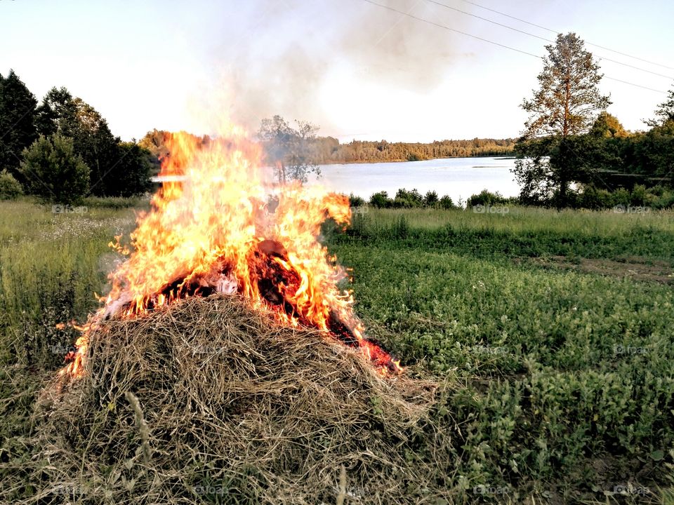 Burning of haystack
