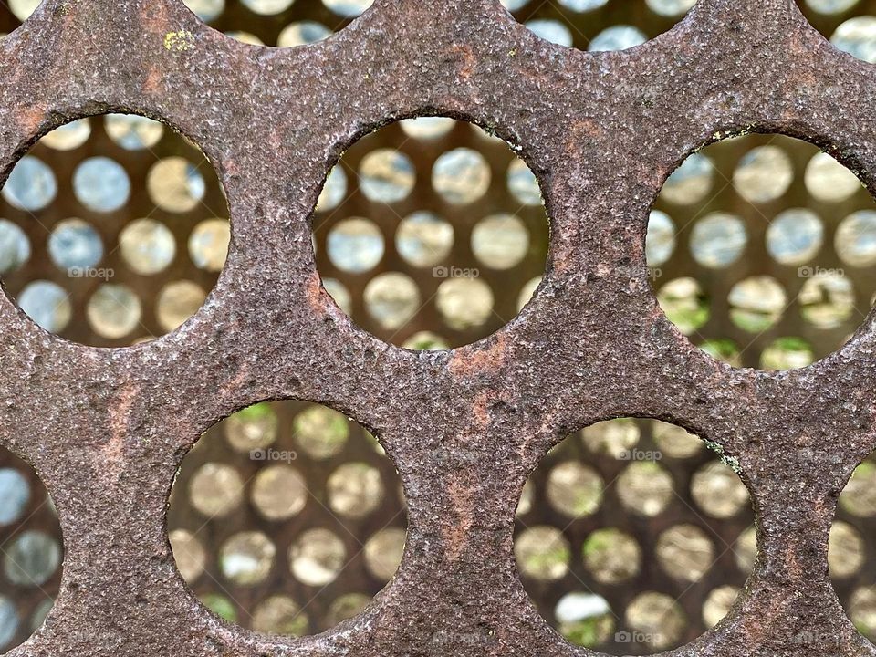Rust on a metal sieve that sorted crushed rock at a quarry