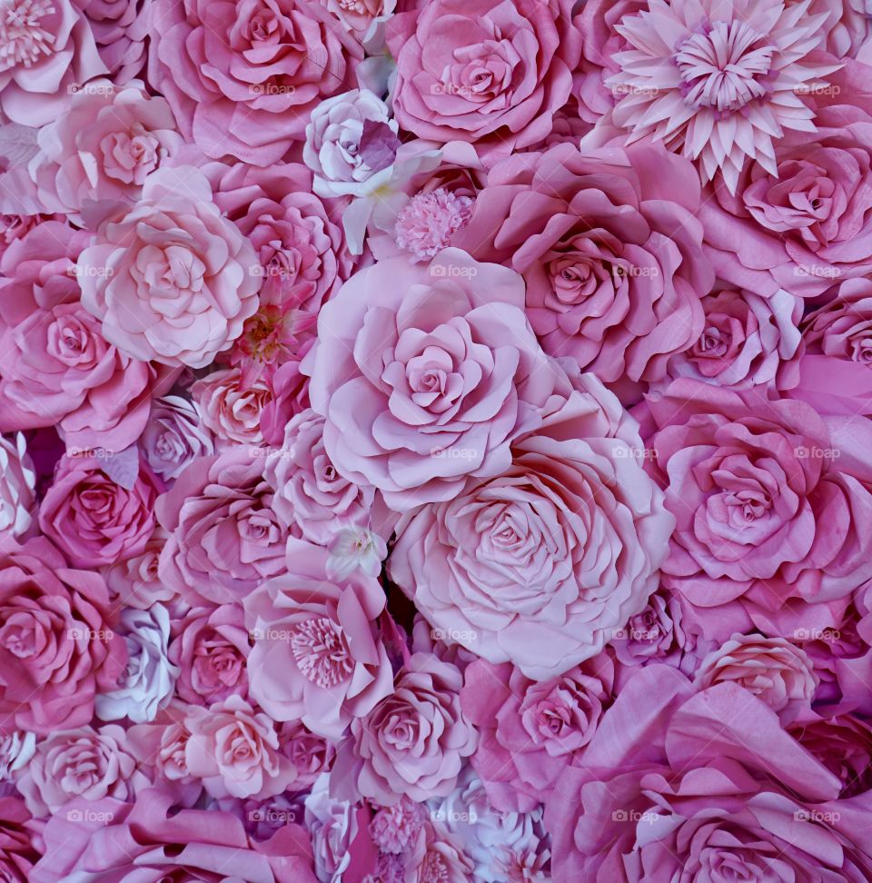 Wall of flowers. Pink Paper flowers. 