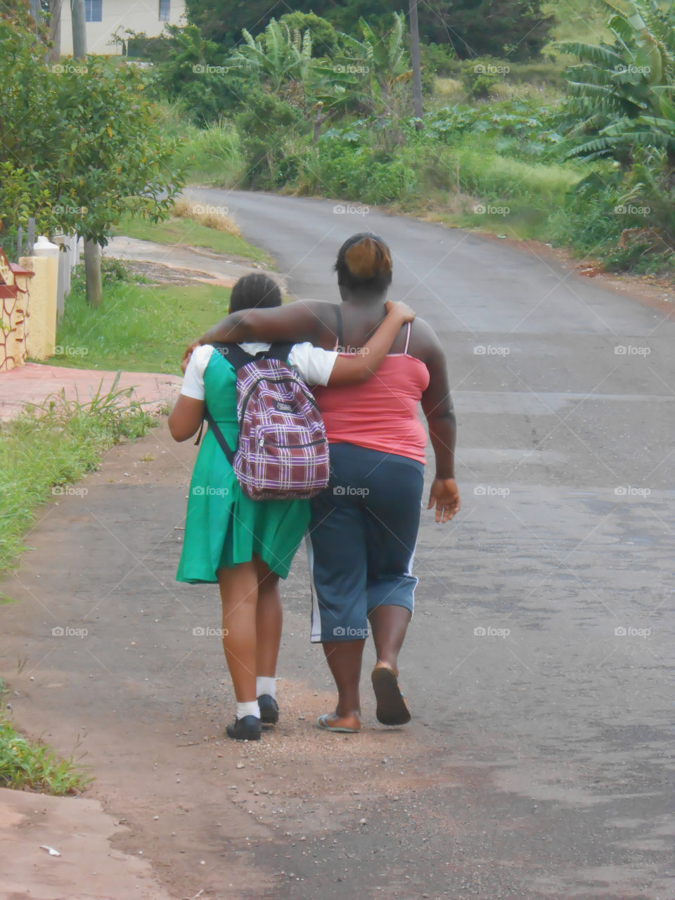 Friends Walking Down The Street
