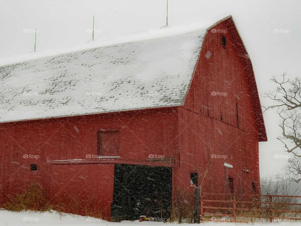 Snow covered barn roof