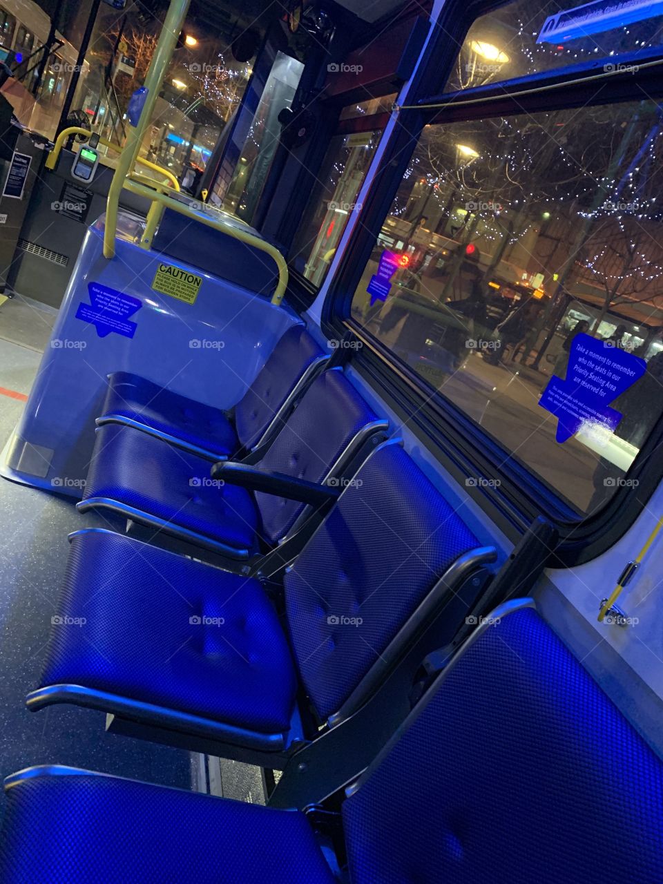 Riding the bus in the city.  