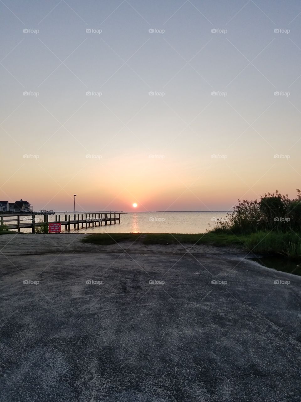 The Sun rising at the pier in Bayville N J