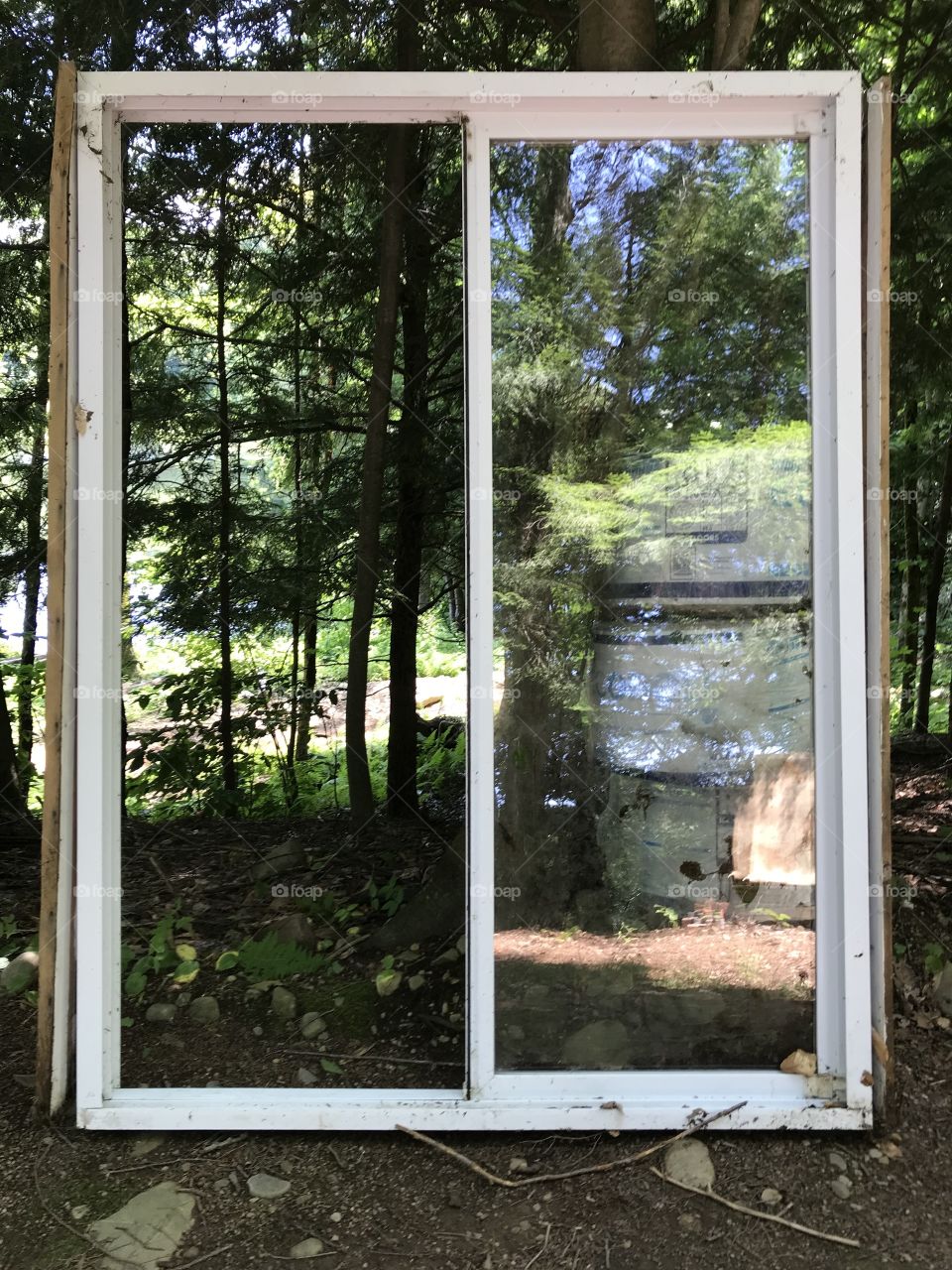 Reflecting ,sliding Glassdoor ,waiting to be placed in porch