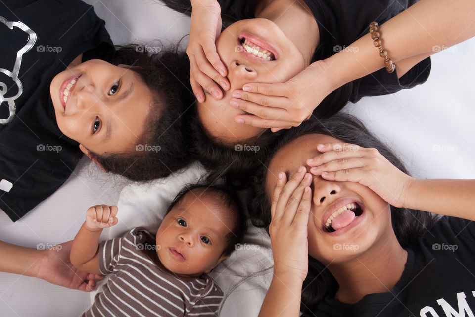 Elevated view of girl with little baby