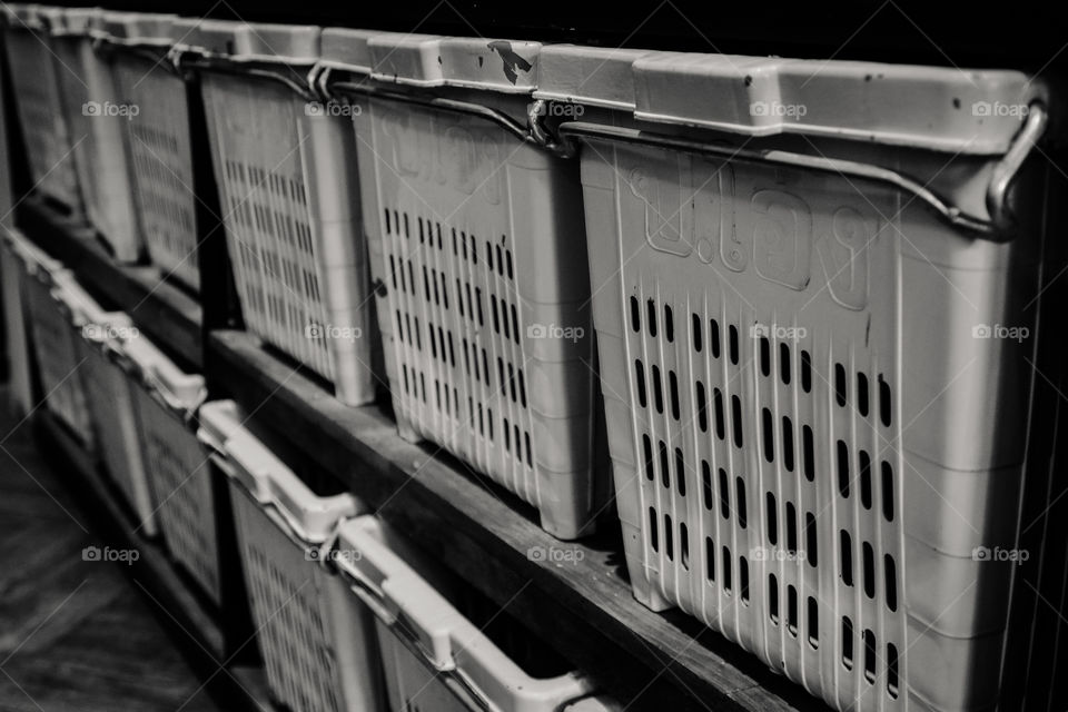 Old plastic box on shelf 