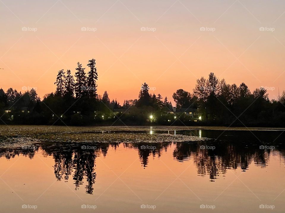 Beautiful sunset landscape on the lake 