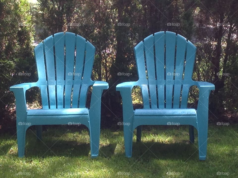 Two Adirondack chairs. 