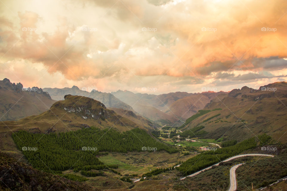 Landscape of mountains and a valley at sunset 