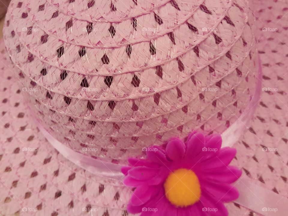 little girl's pretty pink hat