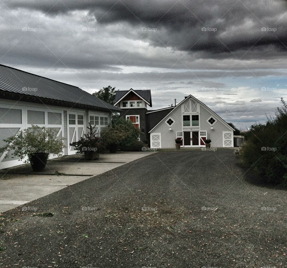 Barn under threatening cloudy sky