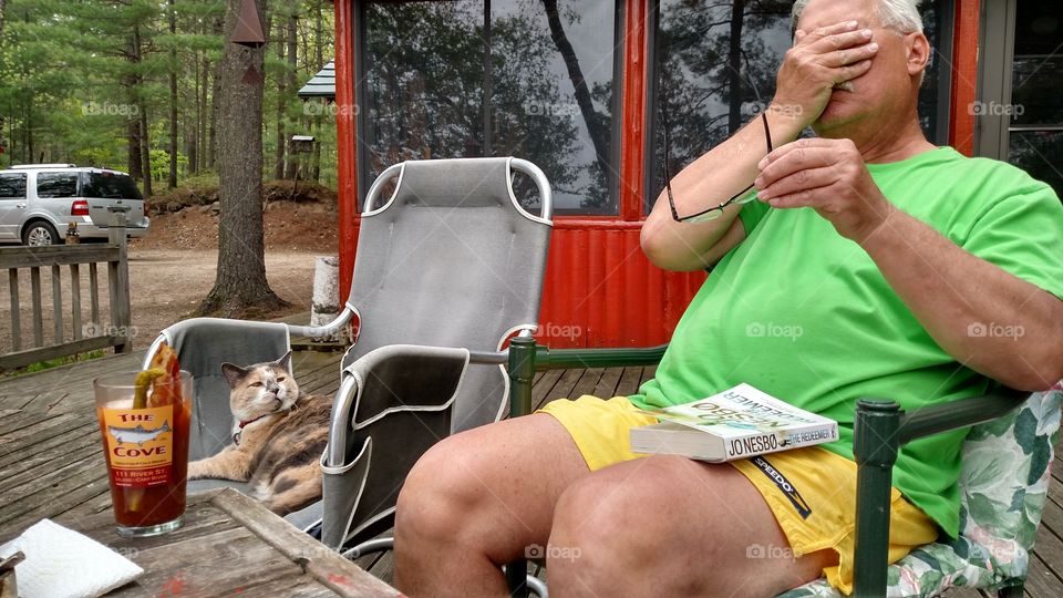 Cat (Mitzi) steals Dad's chair, look on her face. Priceless