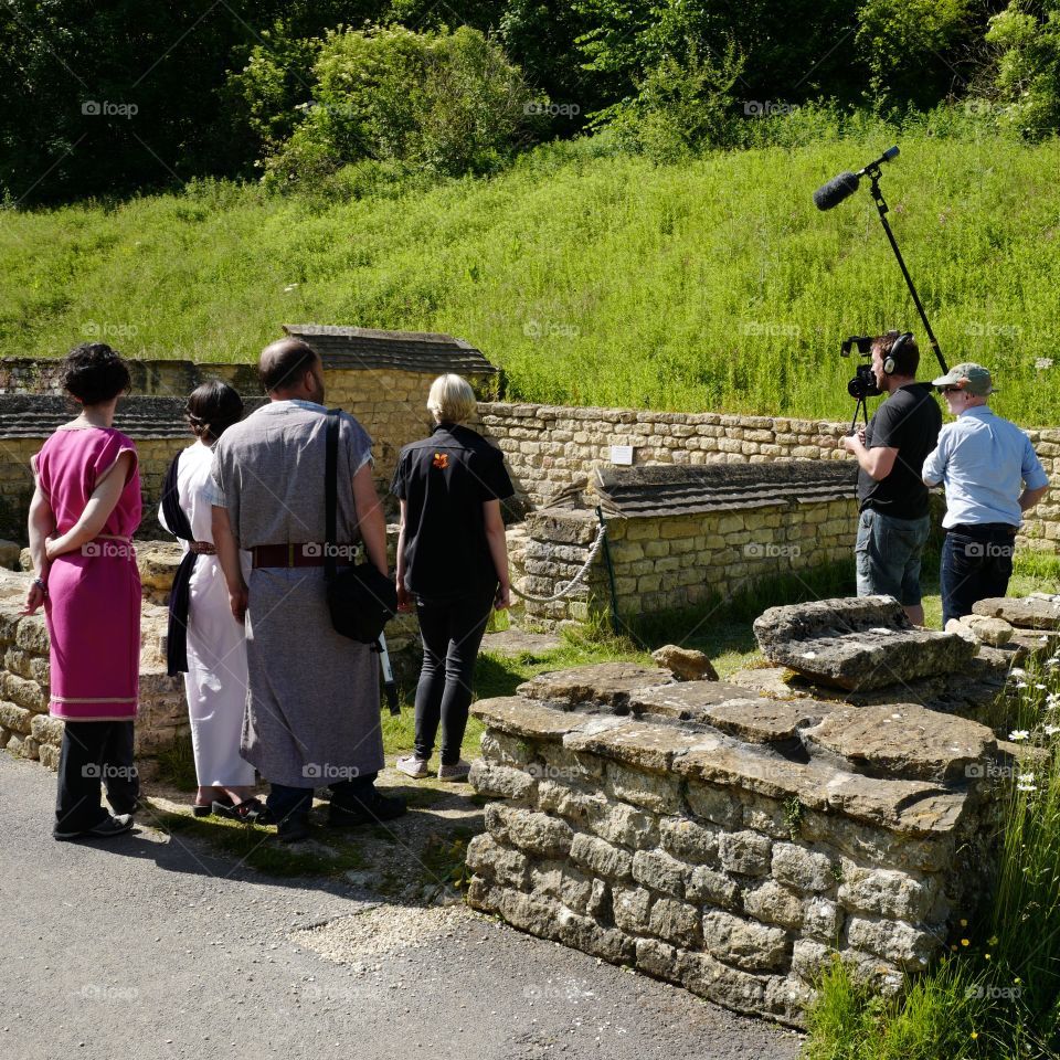 TV. TV film video crew shooting programme in remains of Roman villa UK