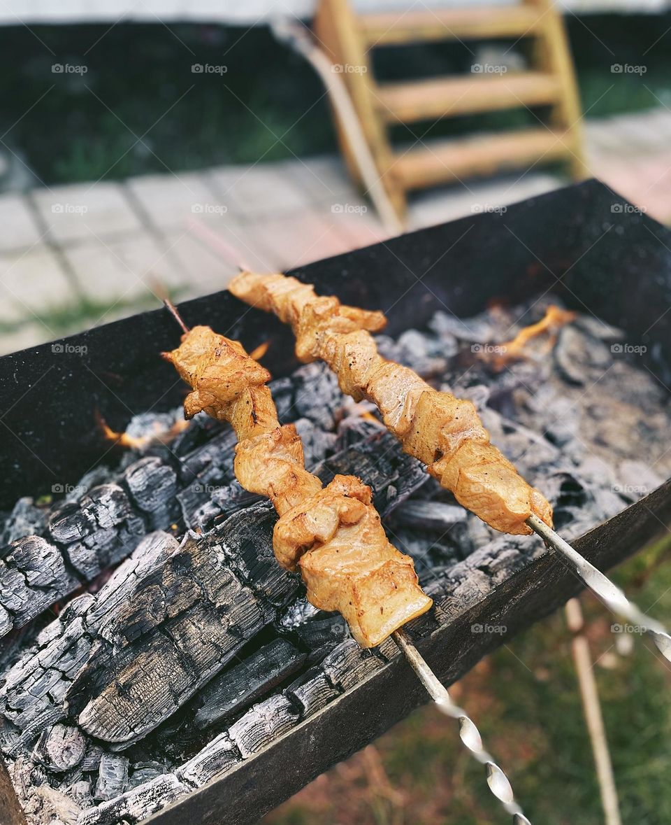 Cooking meat on the brazier