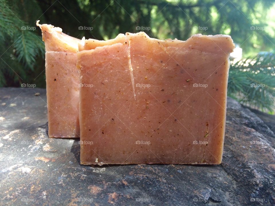 Vanilla Calendula Soap. A couple bars of hand made lye soap shot outdoors