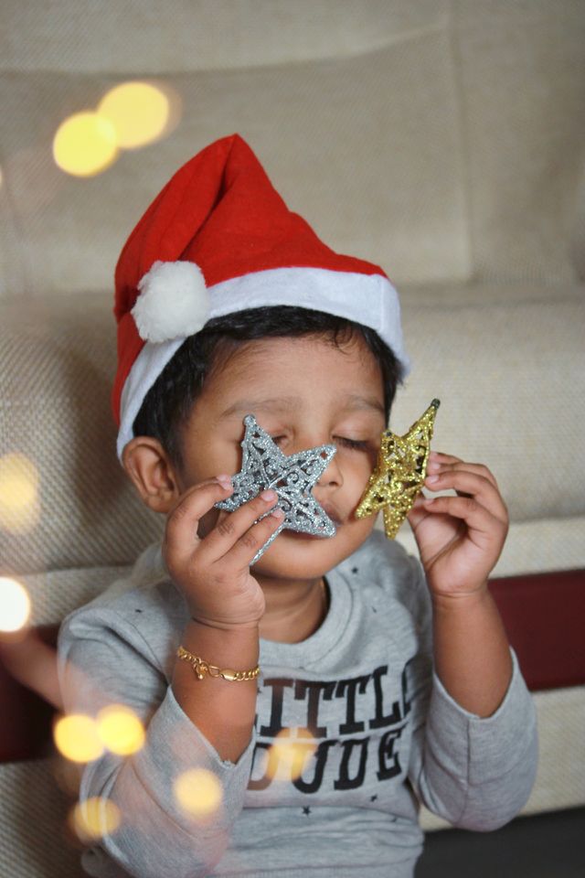 little baby with two little stars