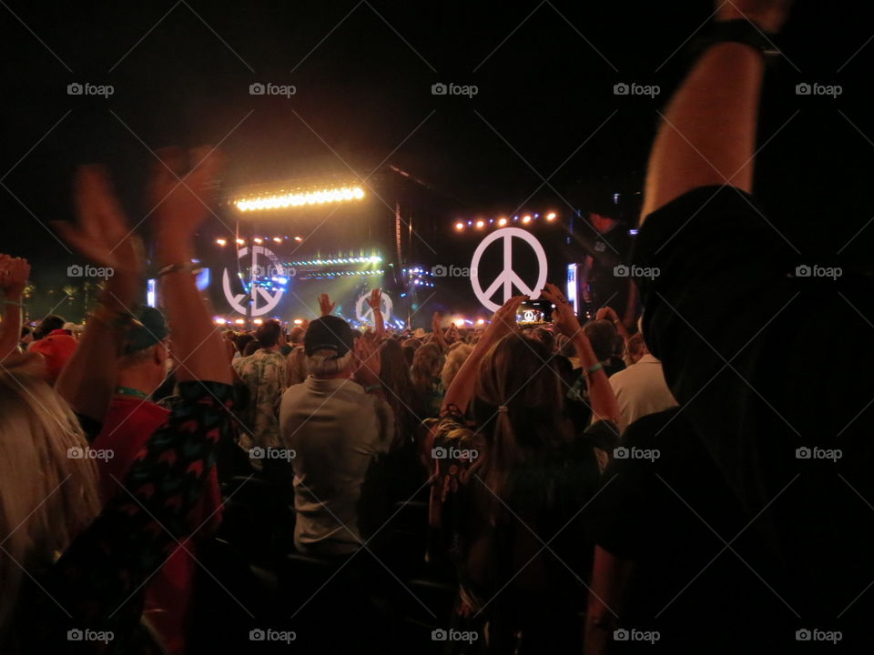 People gathered at a peaceful performance.