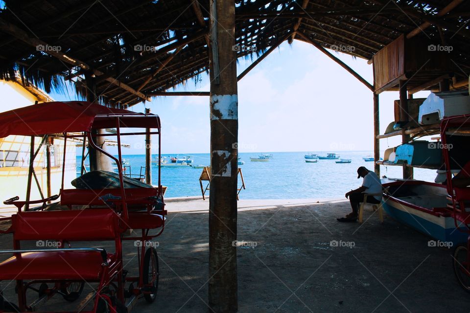 Beautiful view of the sea through a boat garage