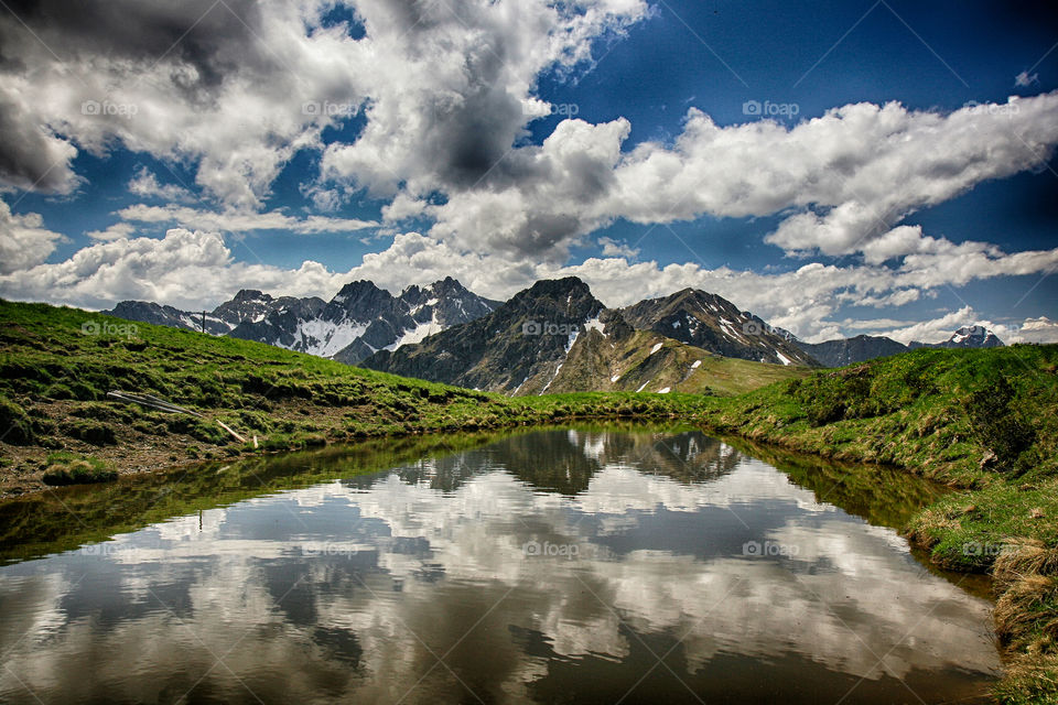 a pond in the mountain