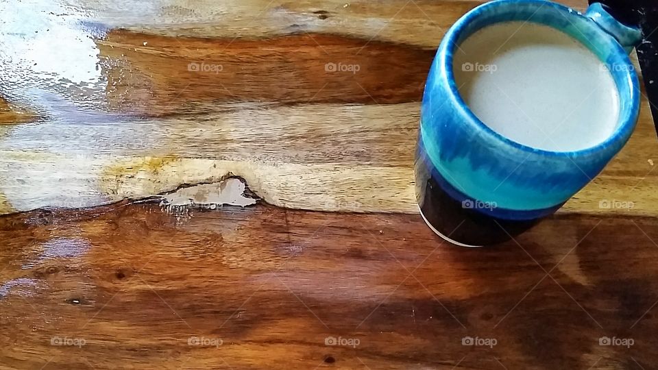coffee with a nice background of wood grain