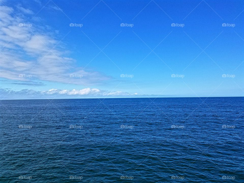 Calm seas and clear skies at the end of the pier!