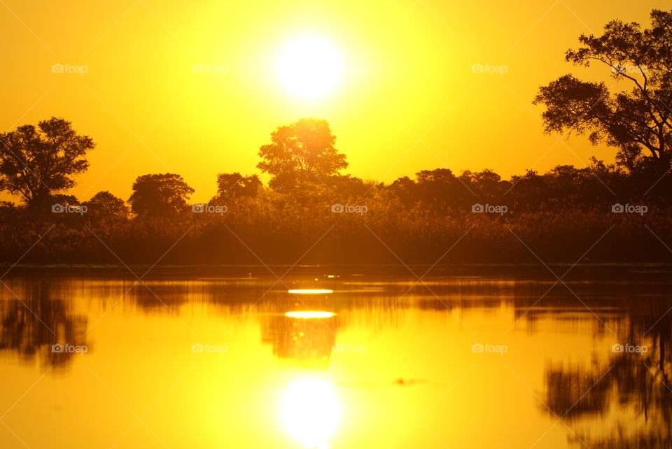 sunset over the okavango delta