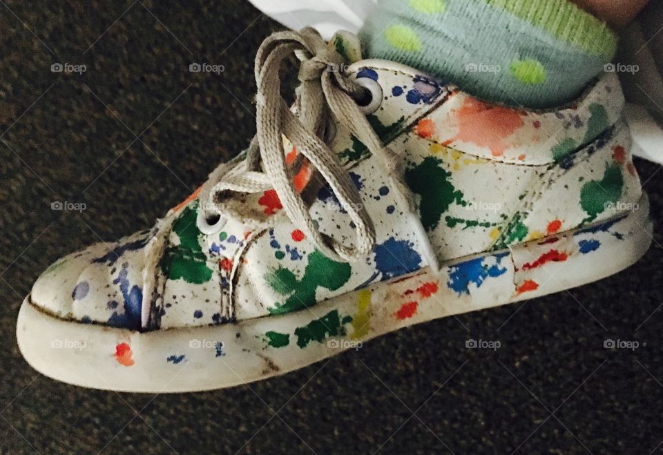 Baby has a colorful pair of shoes
