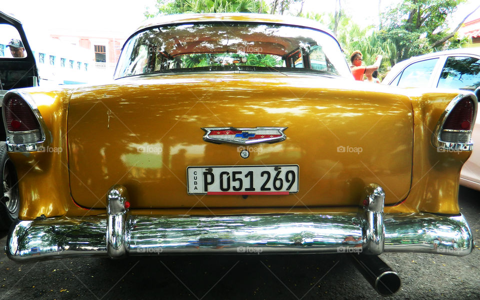 Rear view 1955 Chevy in Cuba. Rear view of this sharp 1955 Chevy was spotted in downtown Santiago, Cuba on a bright sunny day decked out with chrome.