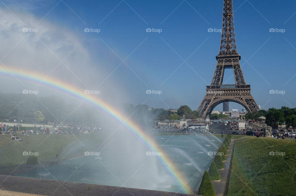 A beautiful rainbow with Eiffel Tower in the background.