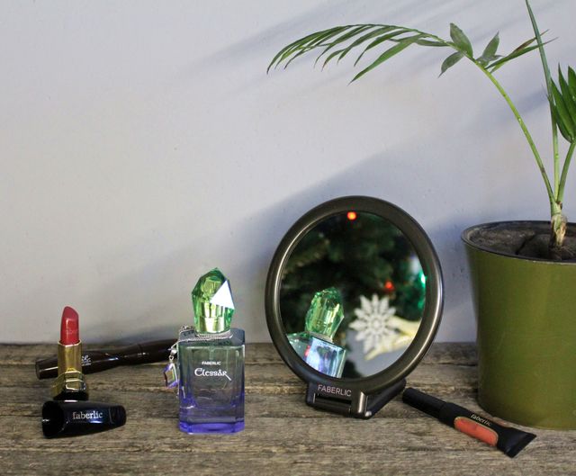 Perfume Elessâr, mirror, lipstick, lipgloss and mascara from Faberlic.
