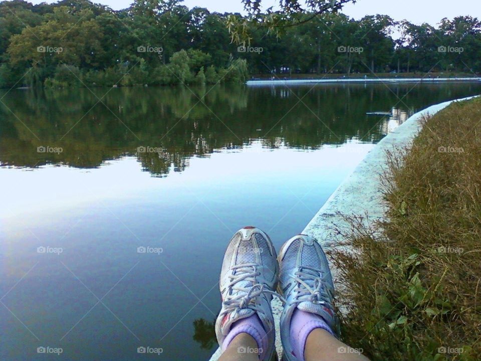 resting after a run by the lake