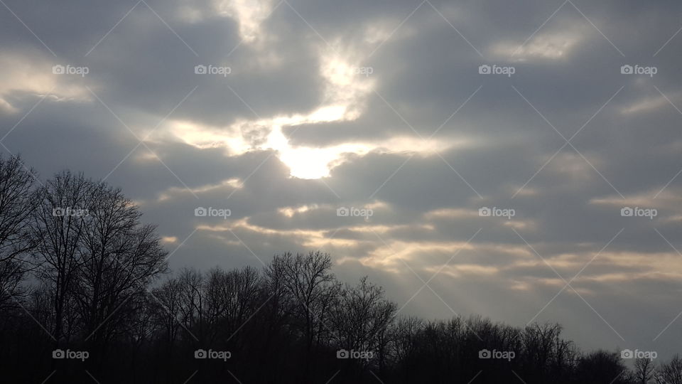 sun rays in a cloudy sky