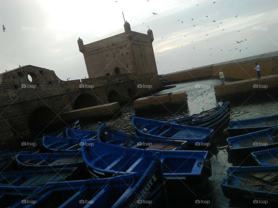 Beautiful blue boats in harbour at essaouira city in Morocco.