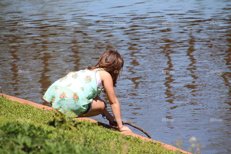 A Girl at the Pond