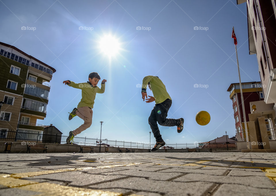 Children playing football