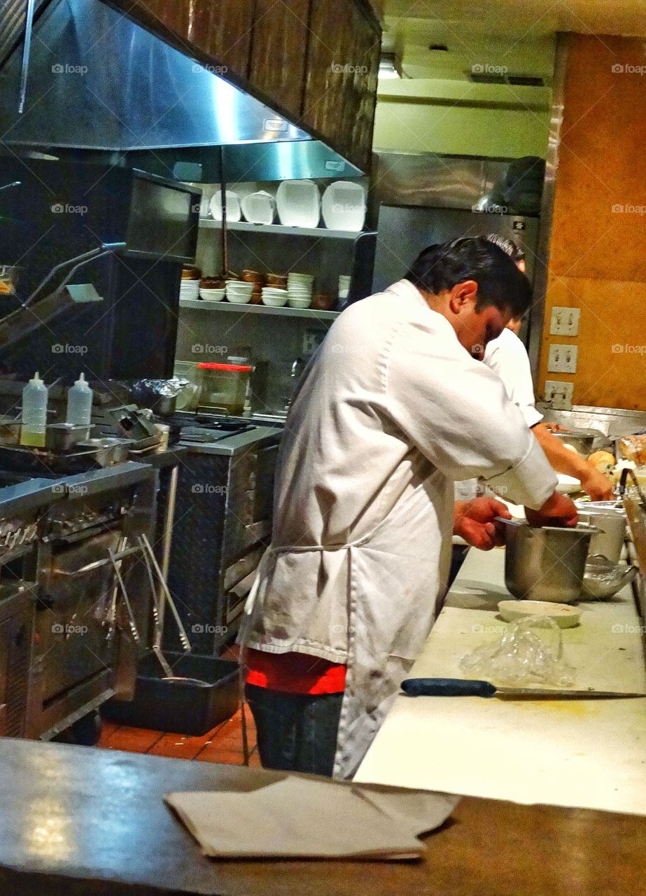 Busy Restaurant Chef. Busy Line Cook In A Gourmet San Francisco Restaurant
