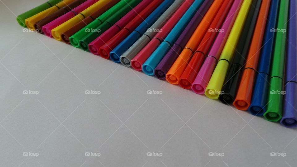 multicolor, fiber pens ,

with left corner
blank copy space