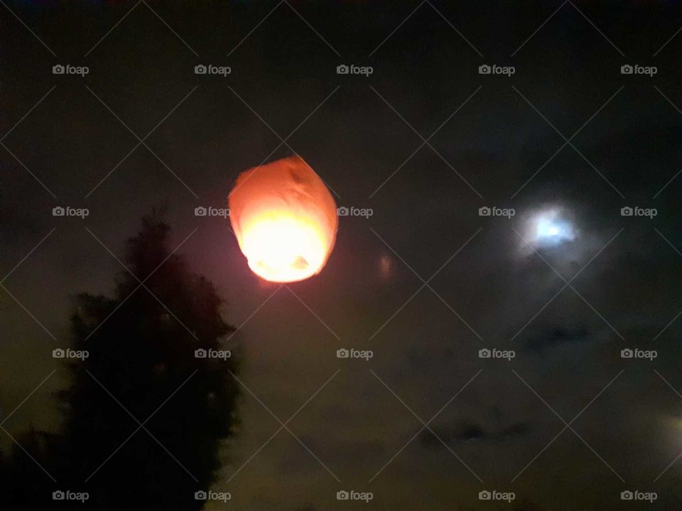 wish balloon goes high into the sky