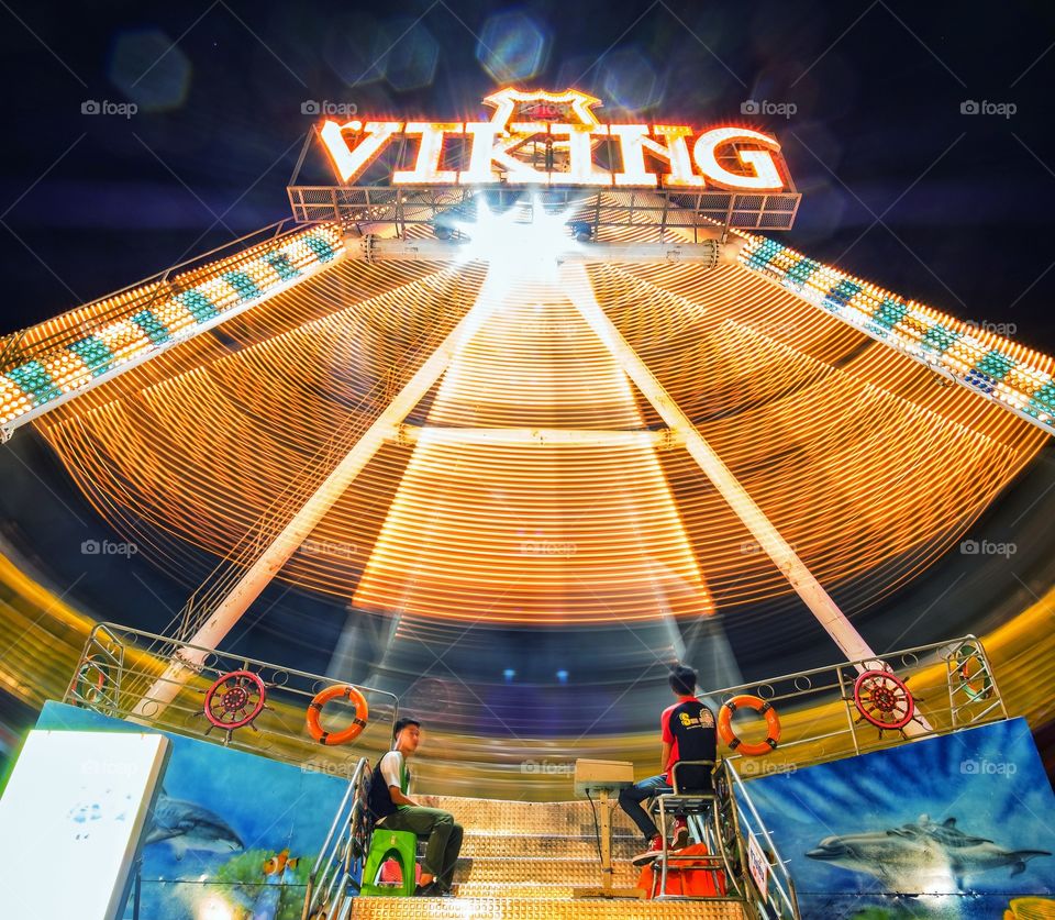 Beautiful light of playing machine in summer holiday at Bangkok countryside ,Thailand