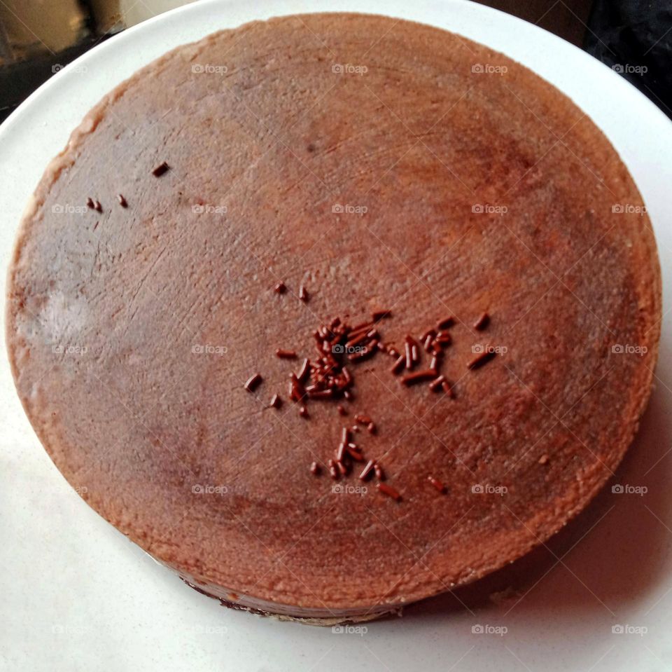 Chocolate cake on white plate