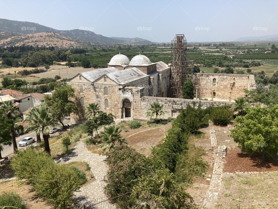 Ancient ruins Sunny holidays I’m Turkey. Walk in the cute city and charming streets by the beach in Kusadasi. perfect blue sky and ocean view. Beach and the shore. To travel is to live. Gorgeous tall palm trees.