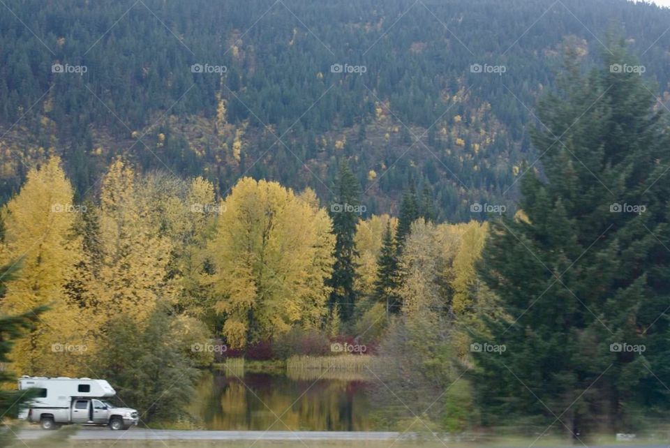 RV along the lake in the fall